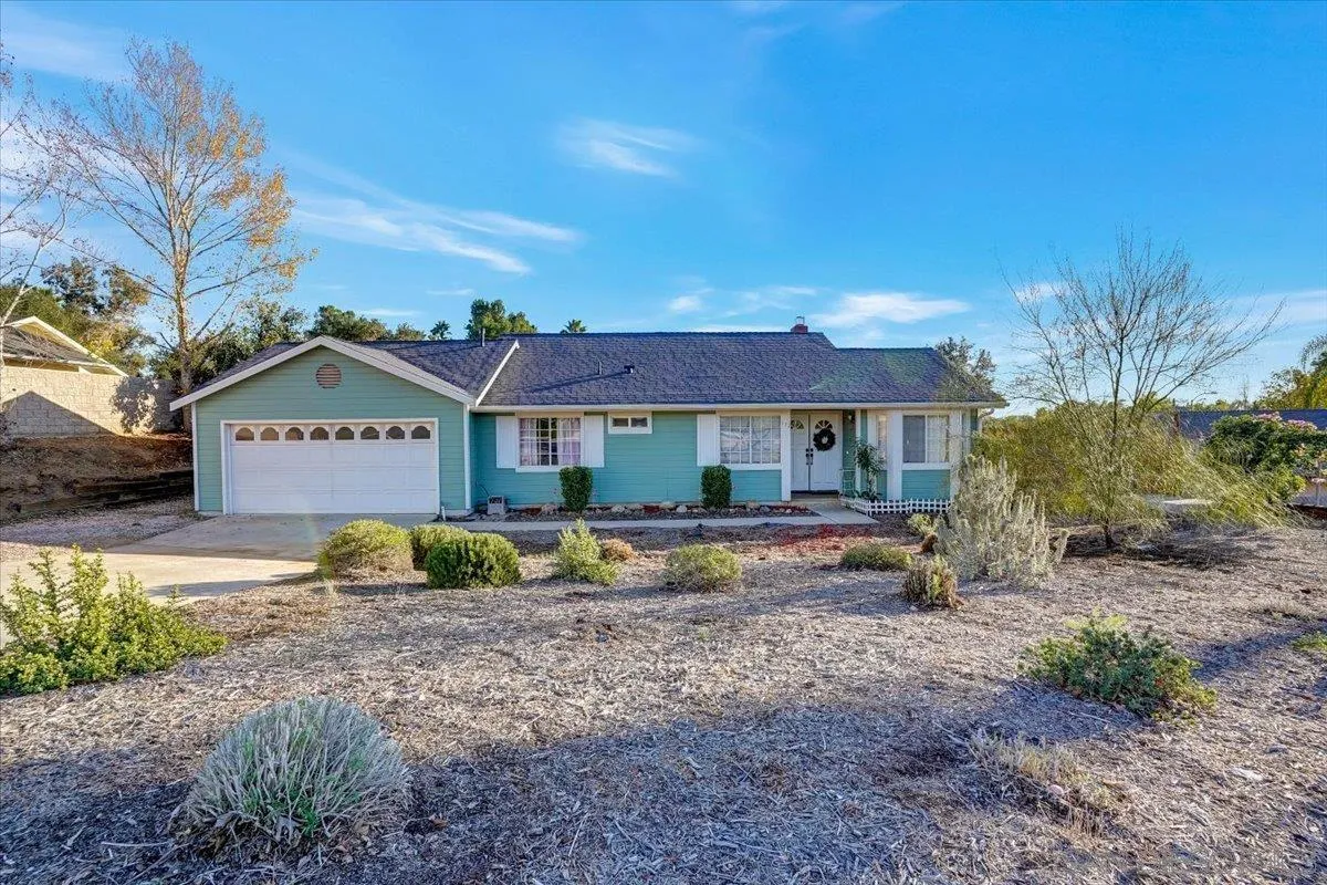 132 Mercedes Road Fallbrook, CA 92028 - Photo 1 of 63 a view of a house with a yard and sitting area
