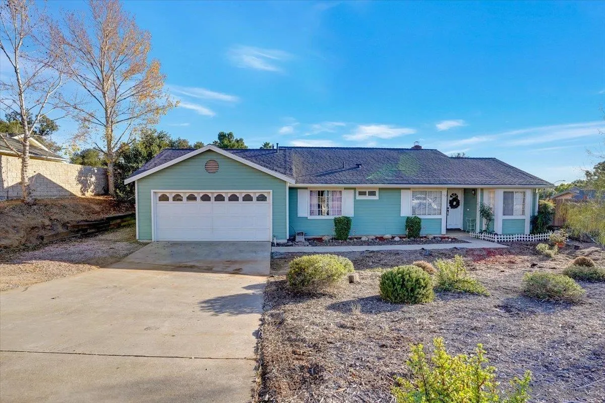132 Mercedes Road Fallbrook, CA 92028 - Photo 2 of 63 a view of a house with backyard and garden