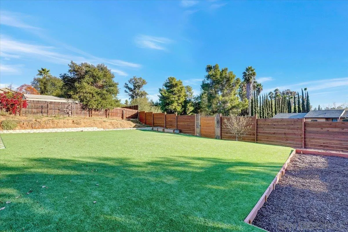 132 Mercedes Road Fallbrook, CA 92028 - Photo 29 of 63 a view of a backyard with a garden