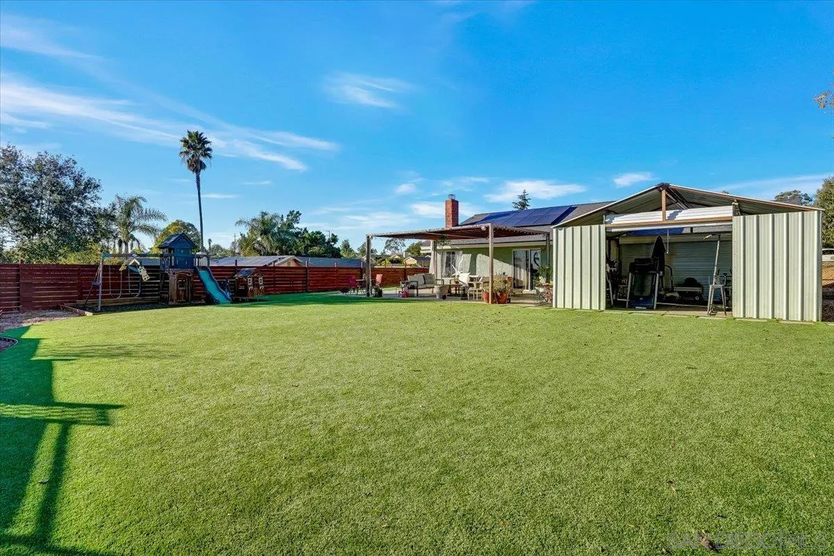 132 Mercedes Road Fallbrook, CA 92028 - Photo 31 of 63 a view of a house with a yard and sitting area