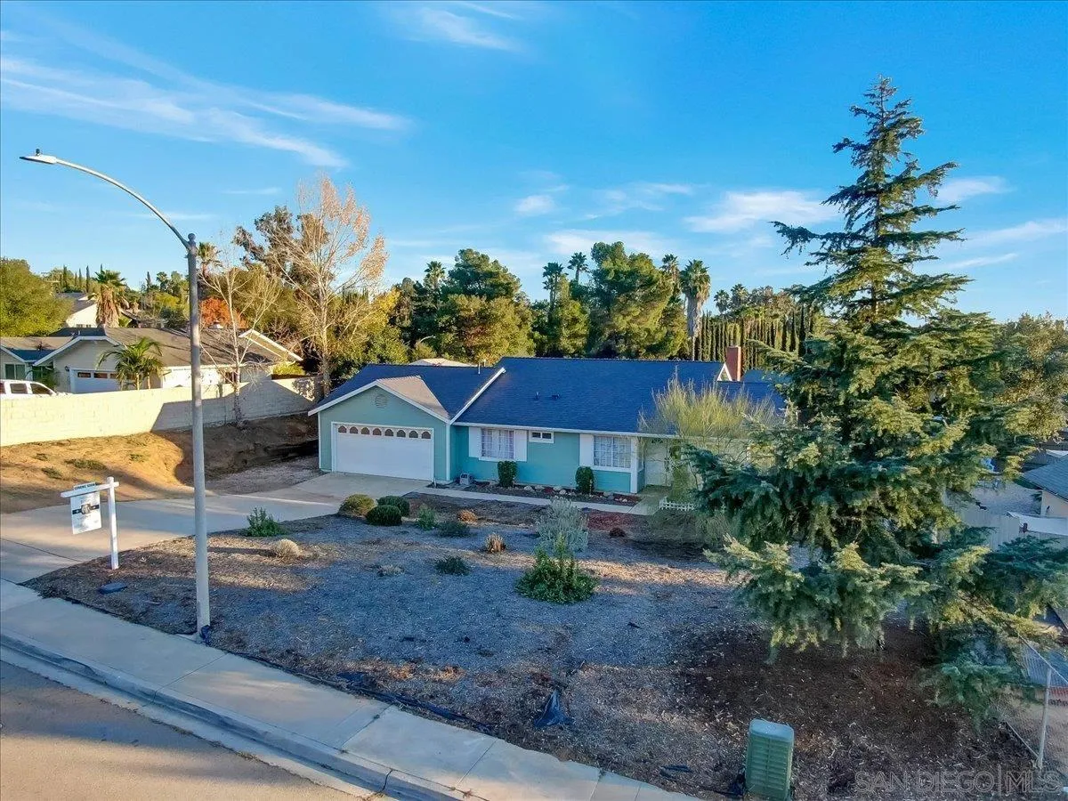 132 Mercedes Road Fallbrook, CA 92028 - Photo 49 of 63 a front view of a house with a yard and tree s