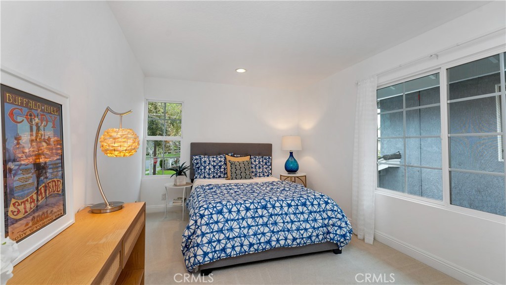 2 Rainstar Irvine, CA 92614 - Photo 19 of 34 a bedroom with a bed and a window in it