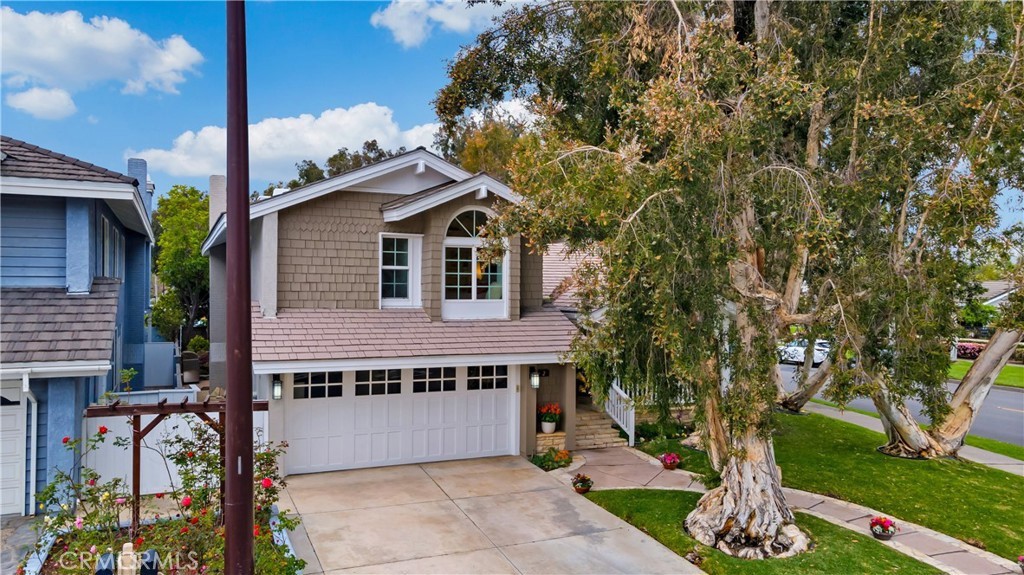 2 Rainstar Irvine, CA 92614 - Photo 2 of 34 a front view of a house with garden