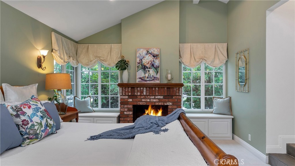2 Rainstar Irvine, CA 92614 - Photo 22 of 34 a bedroom with furniture and a fireplace