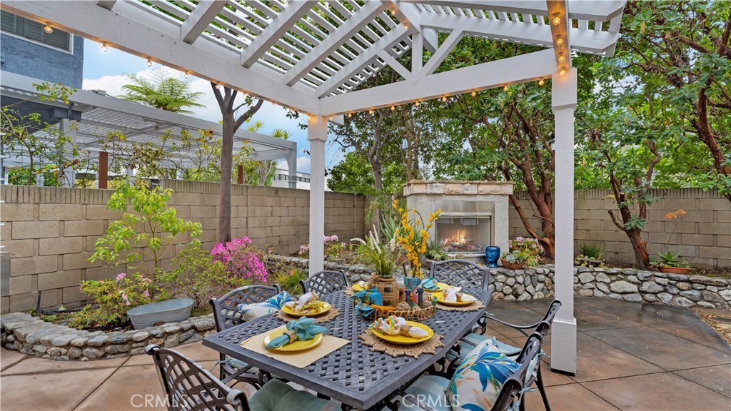 2 Rainstar Irvine, CA 92614 - Photo 26 of 34 a view of an outdoor dining space with a table and chairs