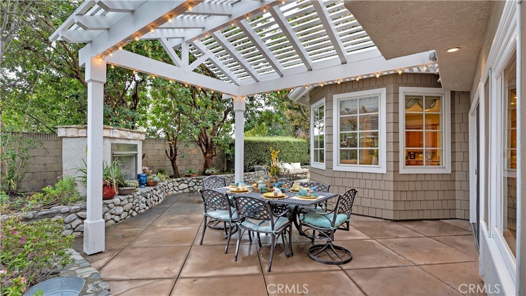 2 Rainstar Irvine, CA 92614 - Photo 27 of 34 a view of a patio with table and chairs and potted plants