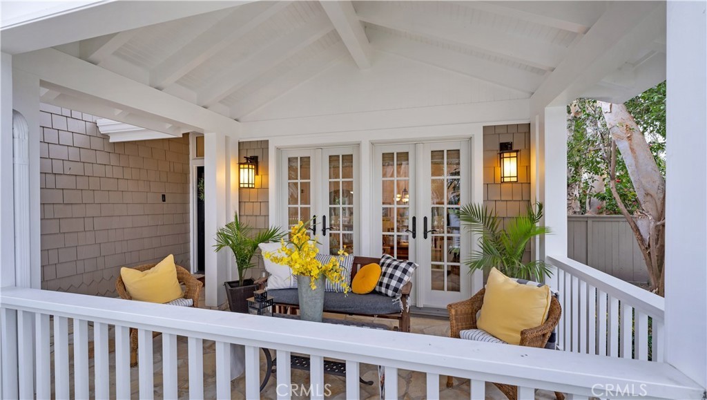 2 Rainstar Irvine, CA 92614 - Photo 5 of 34 a view of a deck with couches chairs potted plants and wooden floor