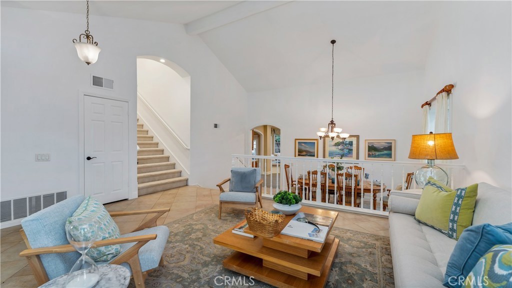 2 Rainstar Irvine, CA 92614 - Photo 10 of 34 a living room with furniture and a chandelier