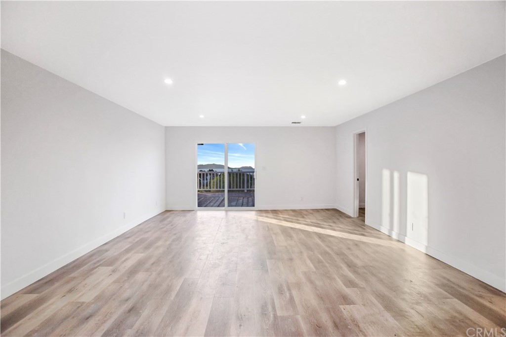14265 Alva Place Perris, CA 92570 - Photo 32 of 59 a view of empty room with wooden floor