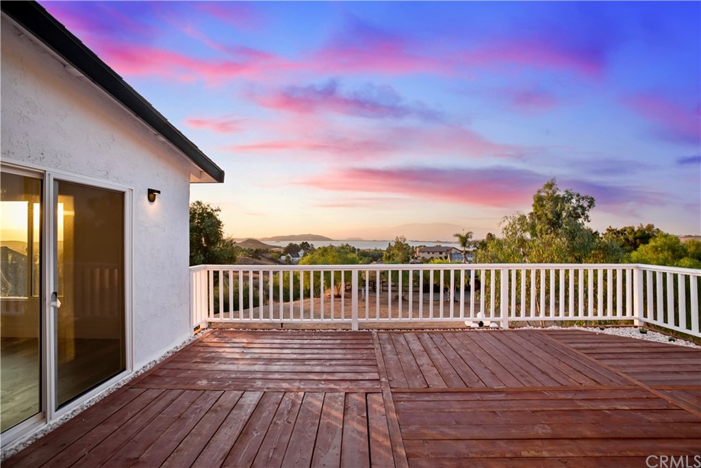 14265 Alva Place Perris, CA 92570 - Photo 40 of 59 a terrace with wooden floor and city view