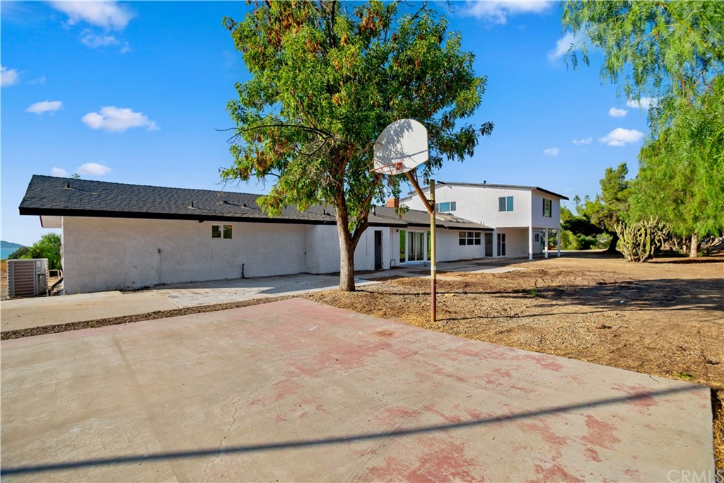 14265 Alva Place Perris, CA 92570 - Photo 46 of 59 a view of a house with basketball court