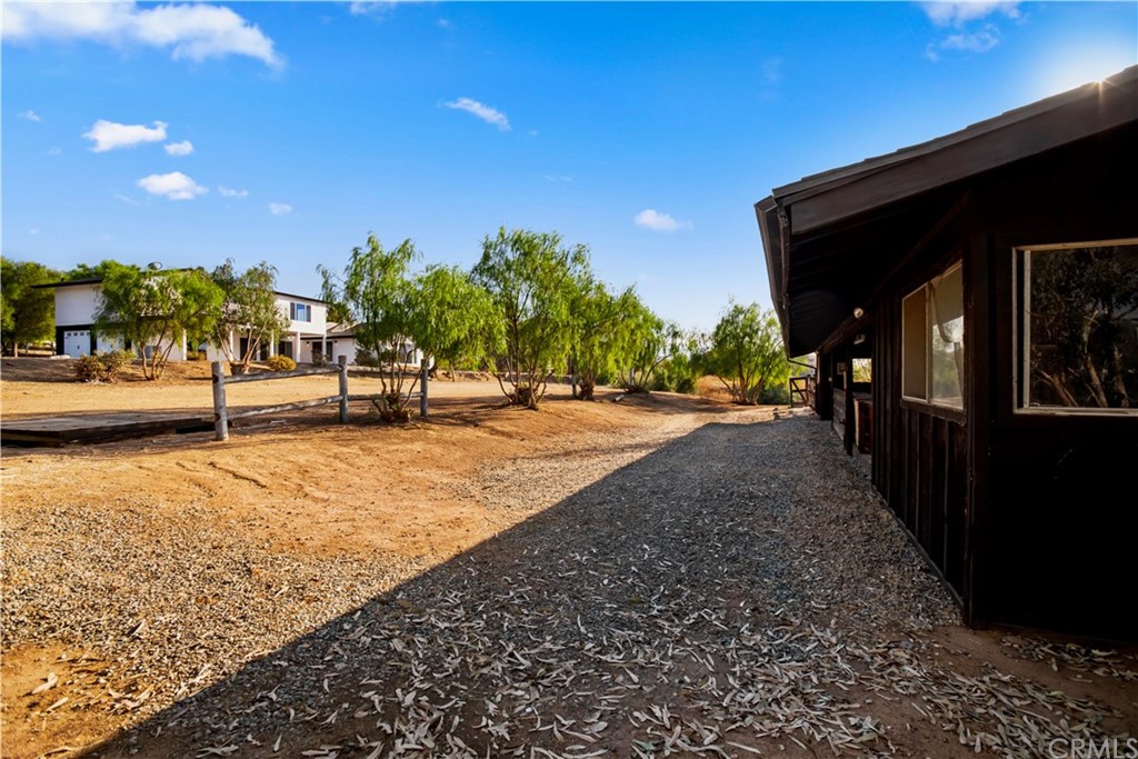 14265 Alva Place Perris, CA 92570 - Photo 57 of 59 a view of a swimming pool with an outdoor seating
