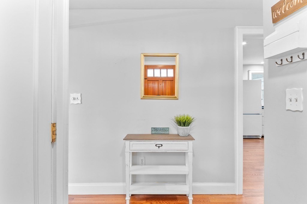 22 Bradley Road Danvers, MA 01923 - Photo 12 of 40 a bathroom with a sink mirror and window