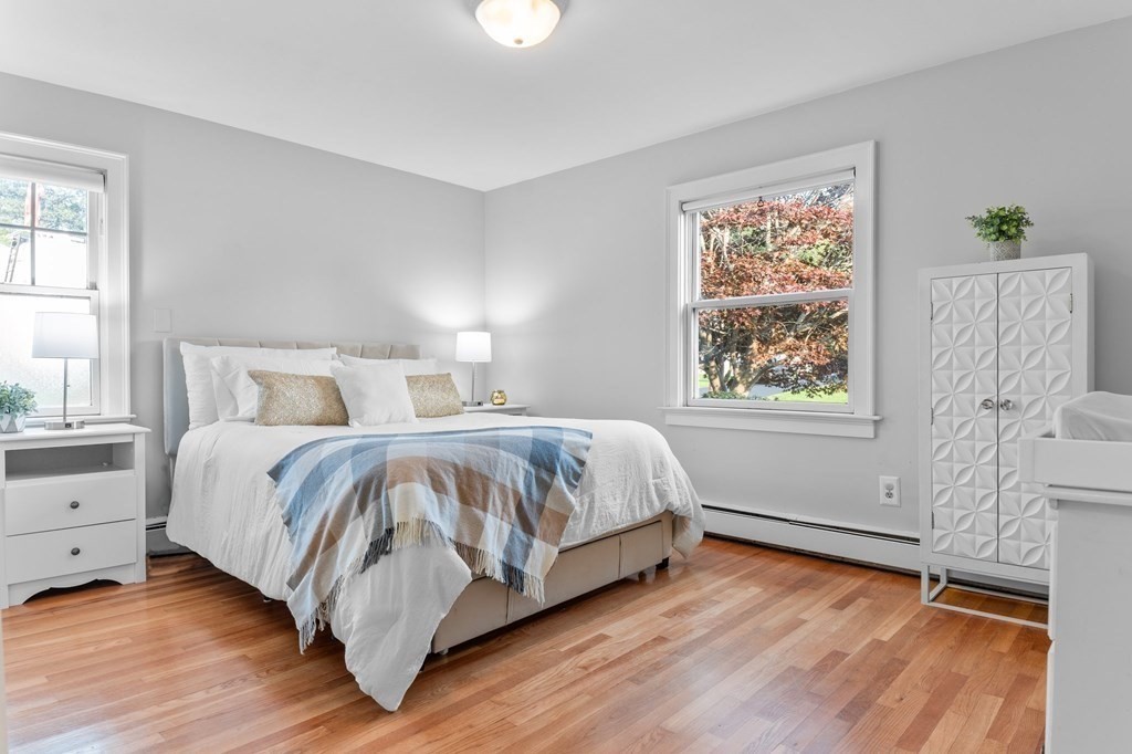 22 Bradley Road Danvers, MA 01923 - Photo 13 of 40 a bedroom with a bed and a window