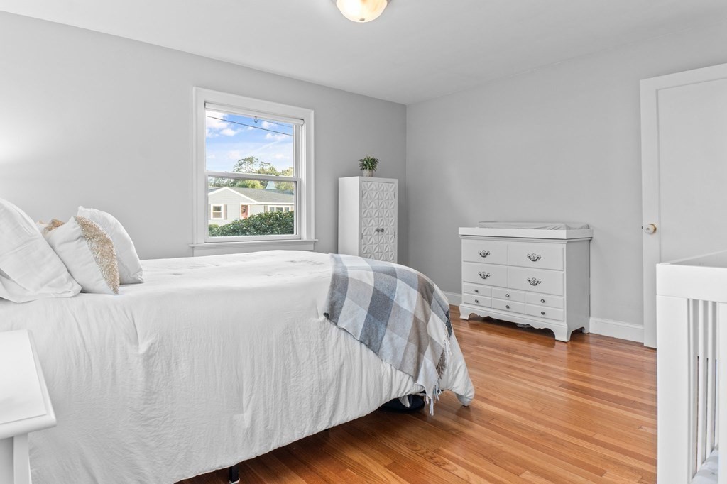 22 Bradley Road Danvers, MA 01923 - Photo 15 of 40 a bedroom with a bed and a window