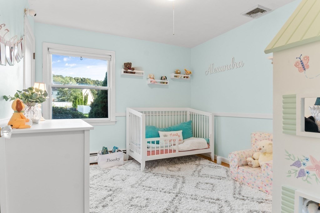 22 Bradley Road Danvers, MA 01923 - Photo 16 of 40 a bathroom with a sink and a window
