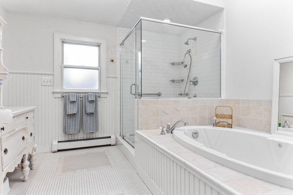 22 Bradley Road Danvers, MA 01923 - Photo 19 of 40 a bathroom with a bathtub and a sink