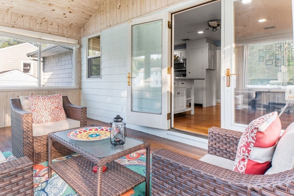 22 Bradley Road Danvers, MA 01923 - Photo 27 of 40 a living room with furniture and a chandelier