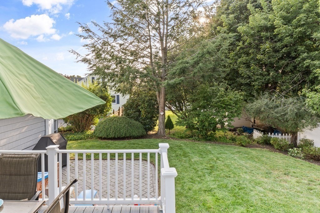 22 Bradley Road Danvers, MA 01923 - Photo 31 of 40 a view of backyard with deck and outdoor seating