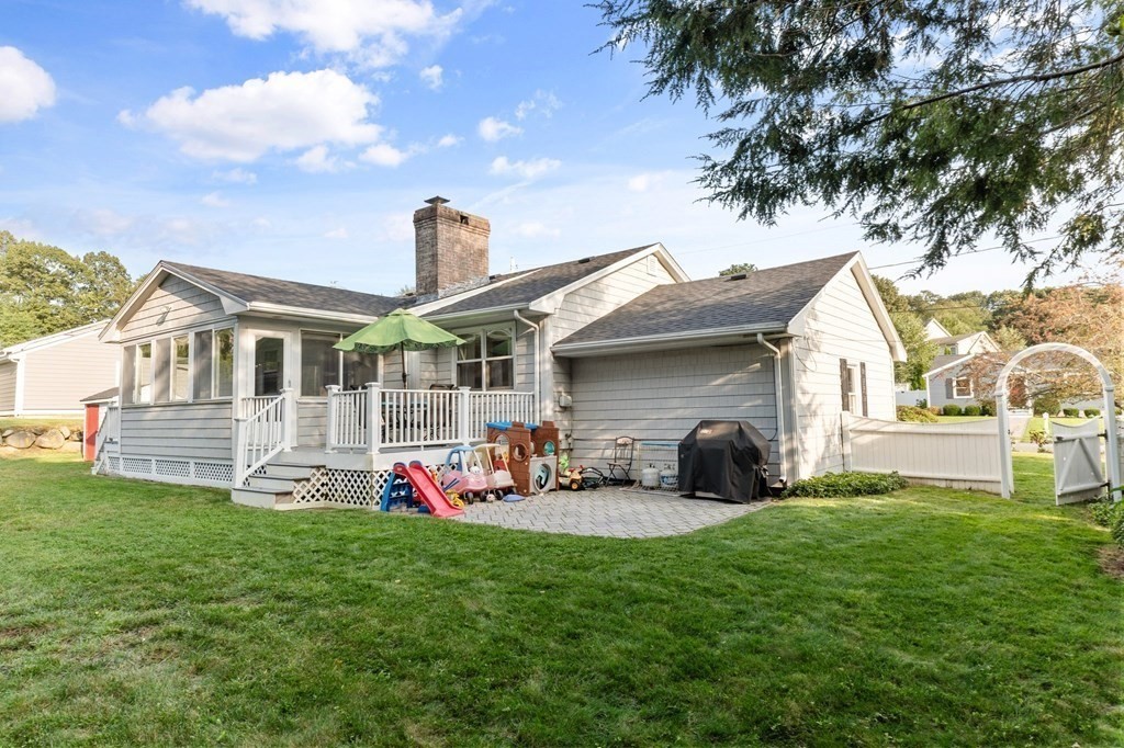 22 Bradley Road Danvers, MA 01923 - Photo 35 of 40 a front view of house with yard and outdoor seating