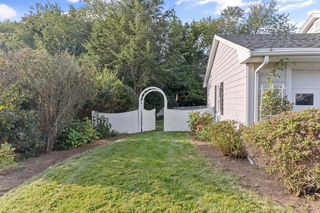 22 Bradley Road Danvers, MA 01923 - Photo 36 of 40 a house view with a garden space