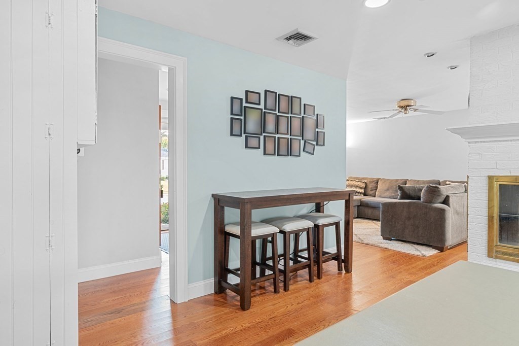 22 Bradley Road Danvers, MA 01923 - Photo 5 of 40 a living room with furniture and a wooden floor