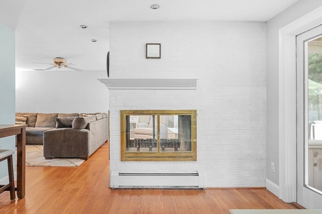 22 Bradley Road Danvers, MA 01923 - Photo 6 of 40 a living room with furniture and a window