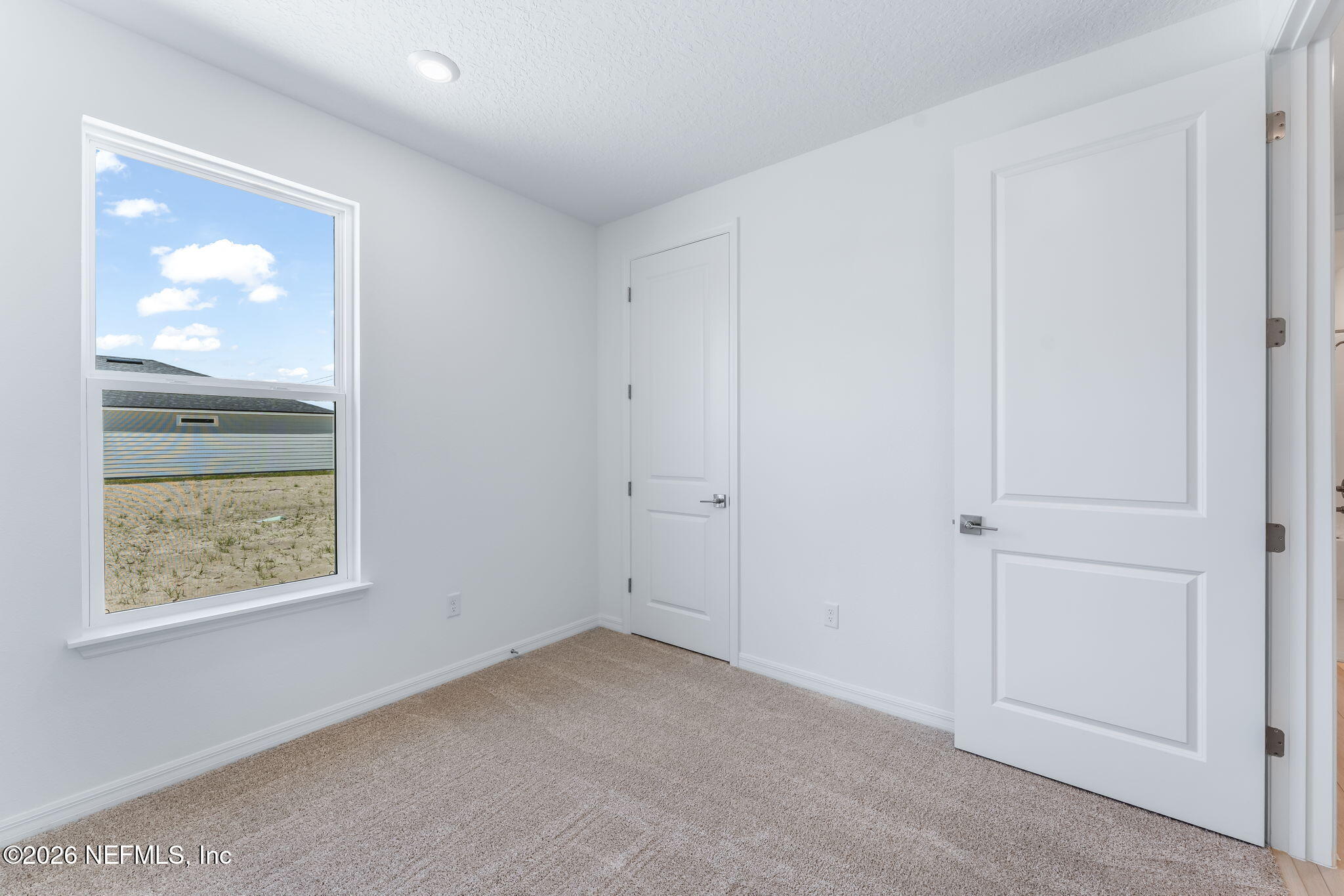 614 Ecliptic Loop Yulee, FL 32097 - Photo 30 of 60 32-web-or-mls-Guest Bedroom