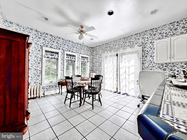 a view of a livingroom with furniture and window