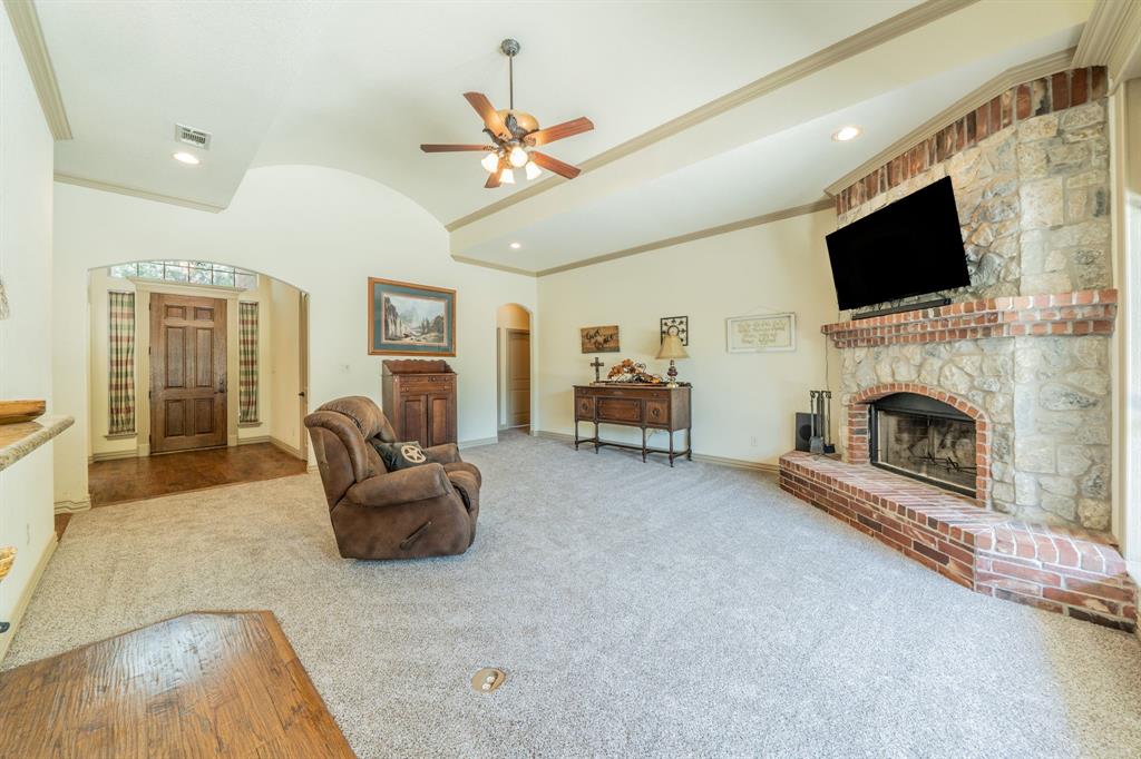 109 Overton Ridge Circle Weatherford, TX 76088 - Photo 3 of 27 Living room - Custom ceiling and crown molding. NEW CARPET!