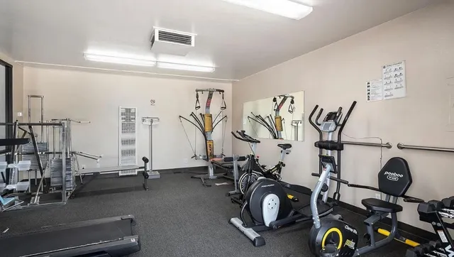a view of a room with gym equipment