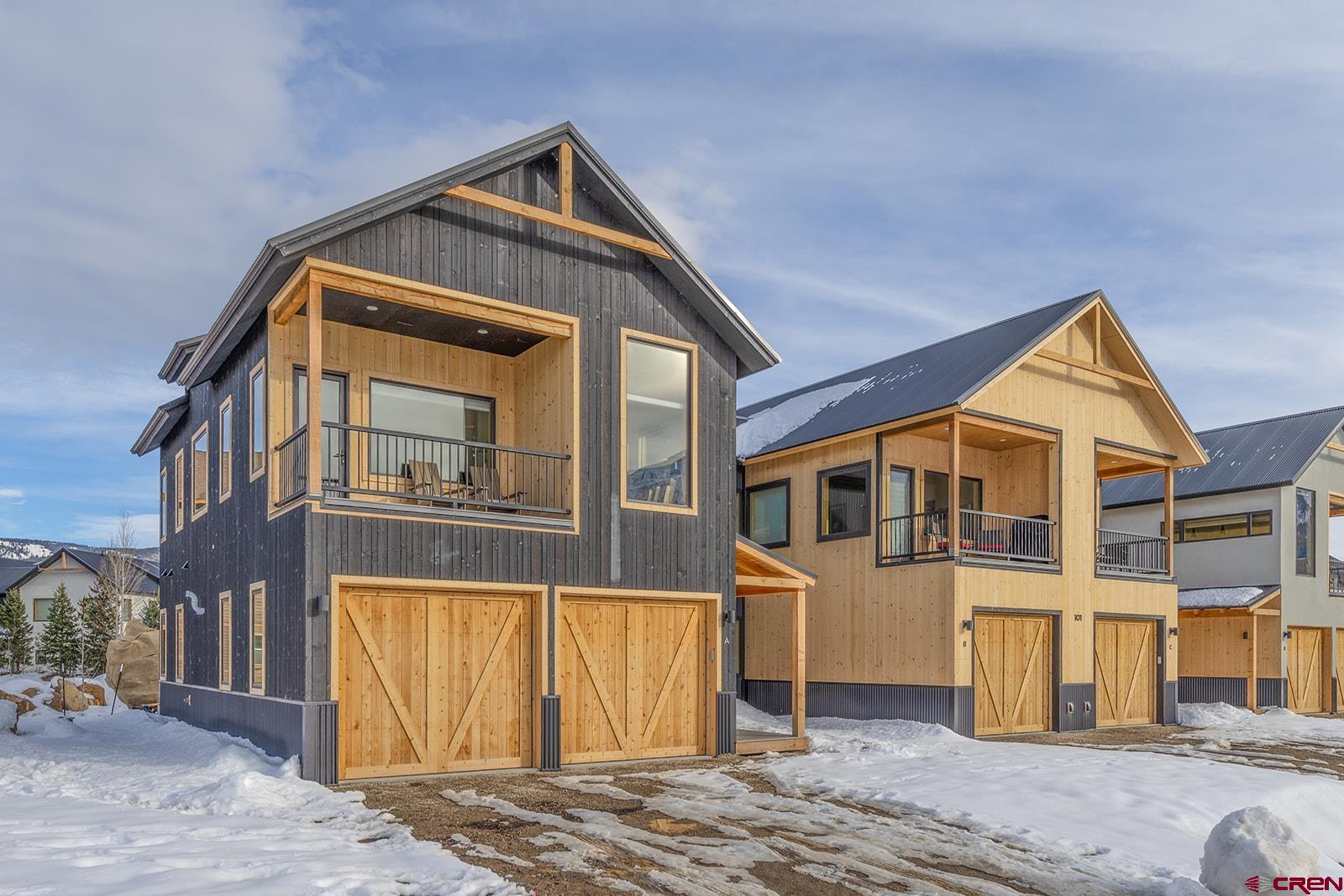 101 Elk Valley Road, Unit A Crested Butte, CO 81224 - Photo 35 of 42 a front view of a house with a yard
