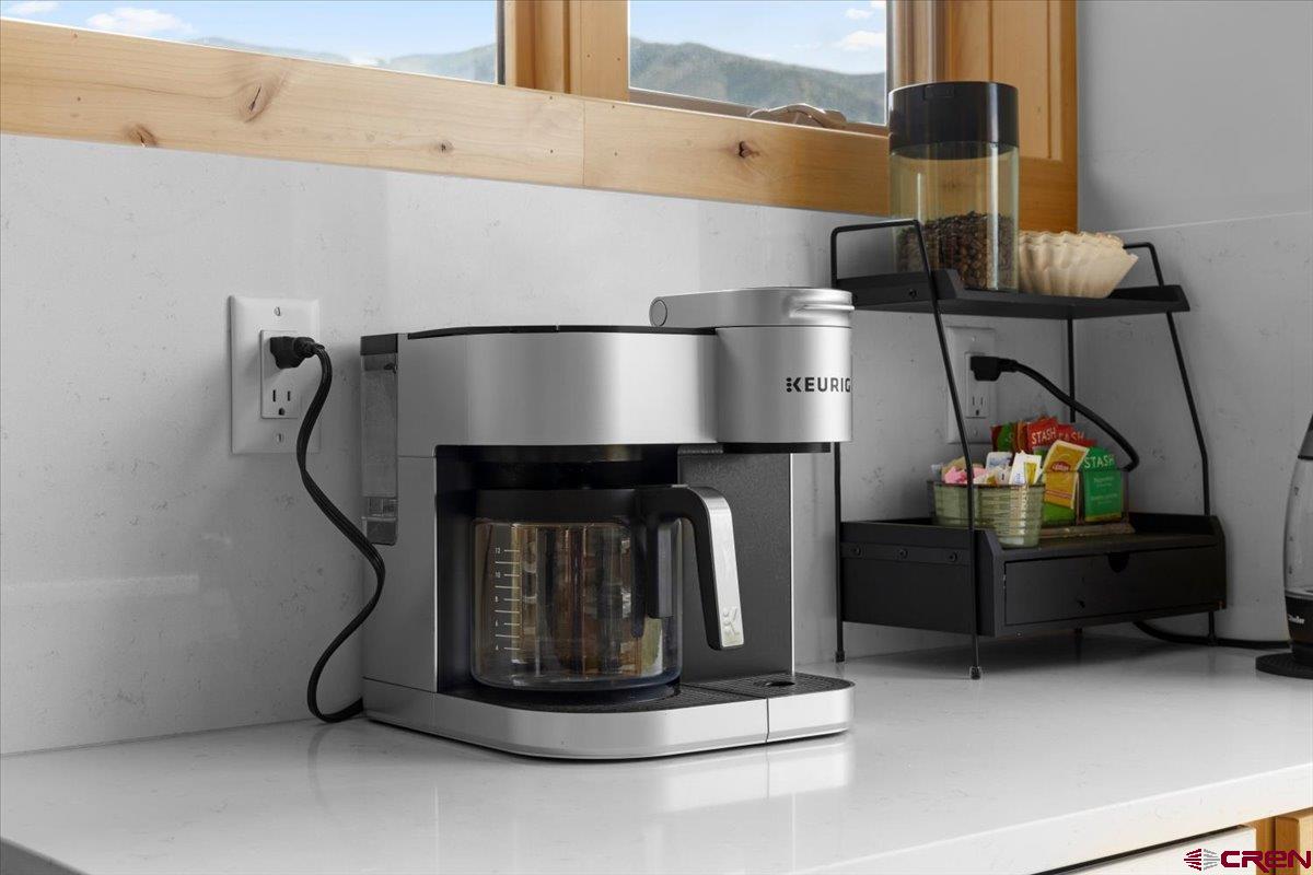 101 Elk Valley Road, Unit A Crested Butte, CO 81224 - Photo 40 of 42 a room with fireplace