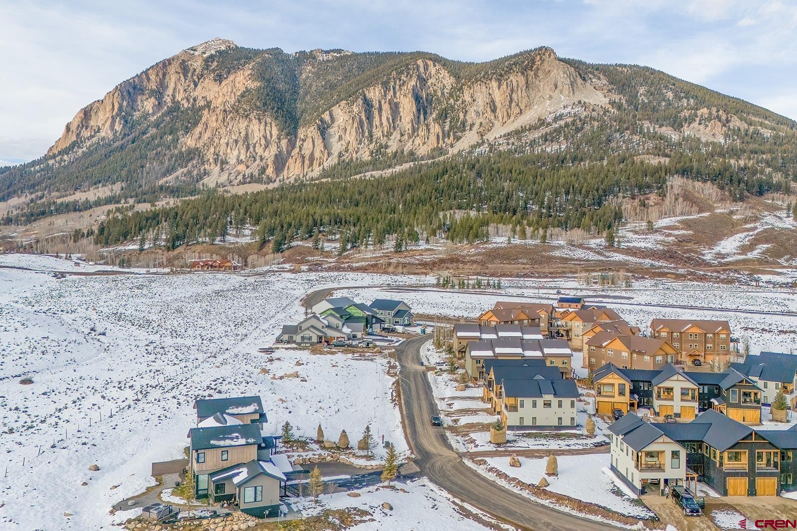 101 Elk Valley Road, Unit A Crested Butte, CO 81224 - Photo 9 of 42 a view of a lake with a mountain