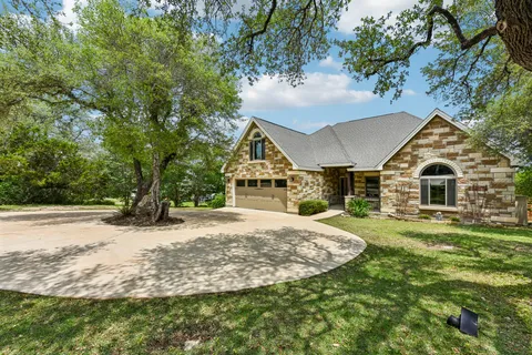 a view of house with outdoor space