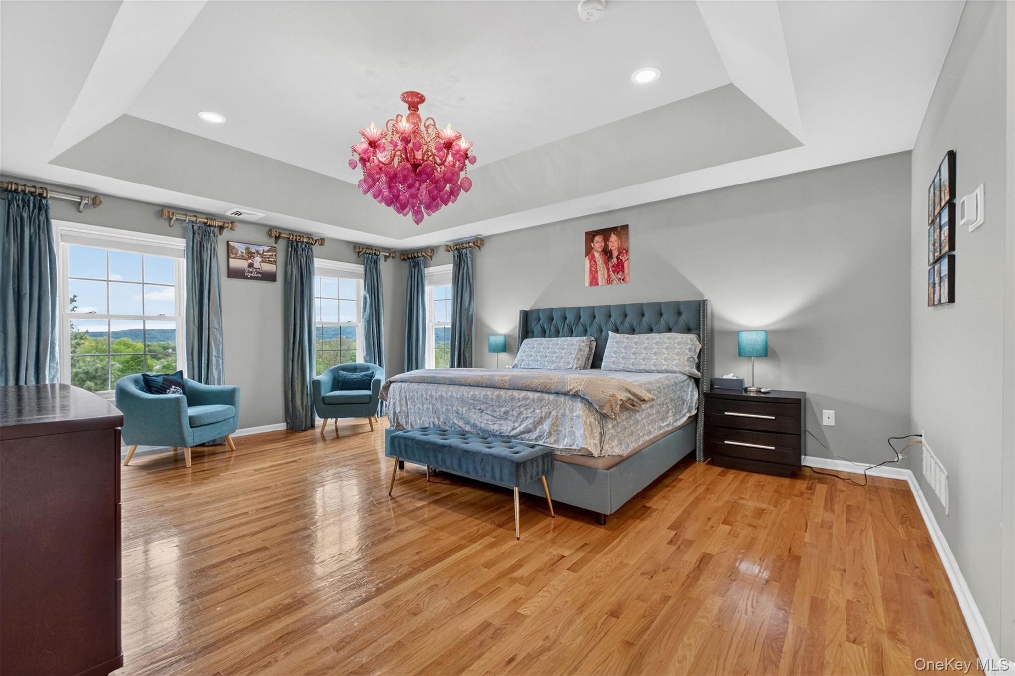 219 Country Club Road Hopewell Junction, NY 12533 - Photo 25 of 49 a bedroom with a bed and wooden floor
