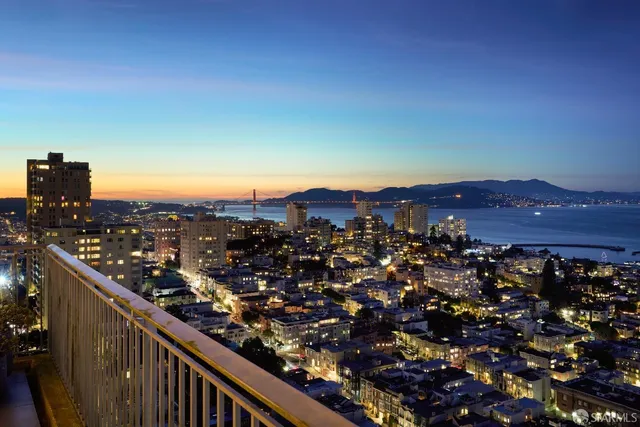 a view of a city with tall buildings