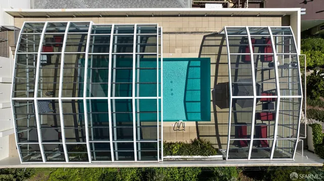 a picture of a room with furniture and white wall