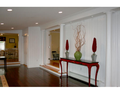 156 Boston Post Road Wayland, MA 01778 - Photo 11 of 20 a living room with a table and chairs