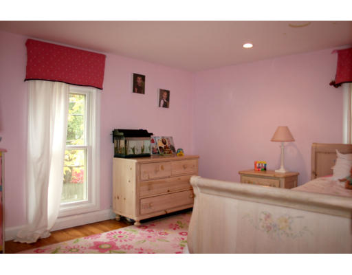 156 Boston Post Road Wayland, MA 01778 - Photo 16 of 20 a bedroom with a bed and a window