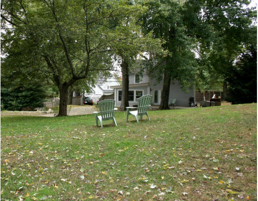 156 Boston Post Road Wayland, MA 01778 - Photo 3 of 20 a view of a park with large trees