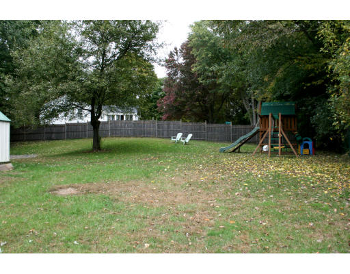 156 Boston Post Road Wayland, MA 01778 - Photo 4 of 20 a view of a garden with a slide