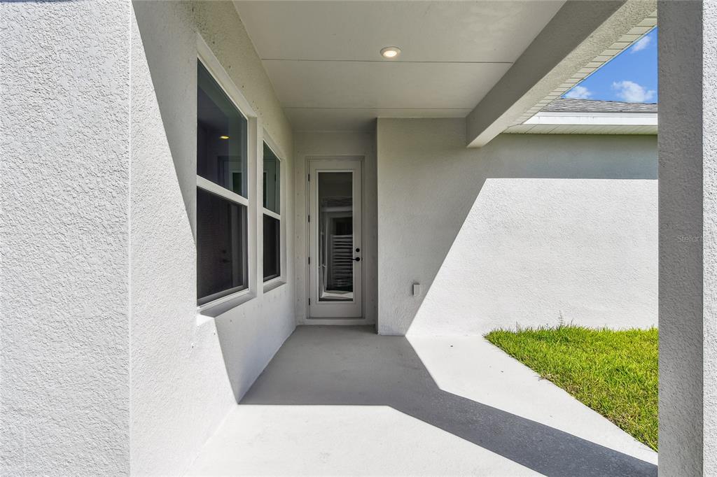 11743 Full Moon Loop Parrish, FL 34219 - Photo 38 of 42 a view of entryway with furniture and garden