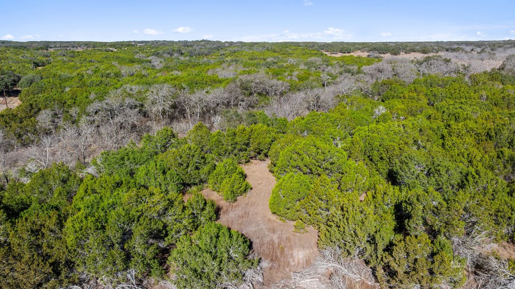 Tbd Lucky Hit Road Leander, TX 78641 - Photo 21 of 27 a view of a lake with a yard