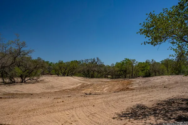 a view of a backyard of the house