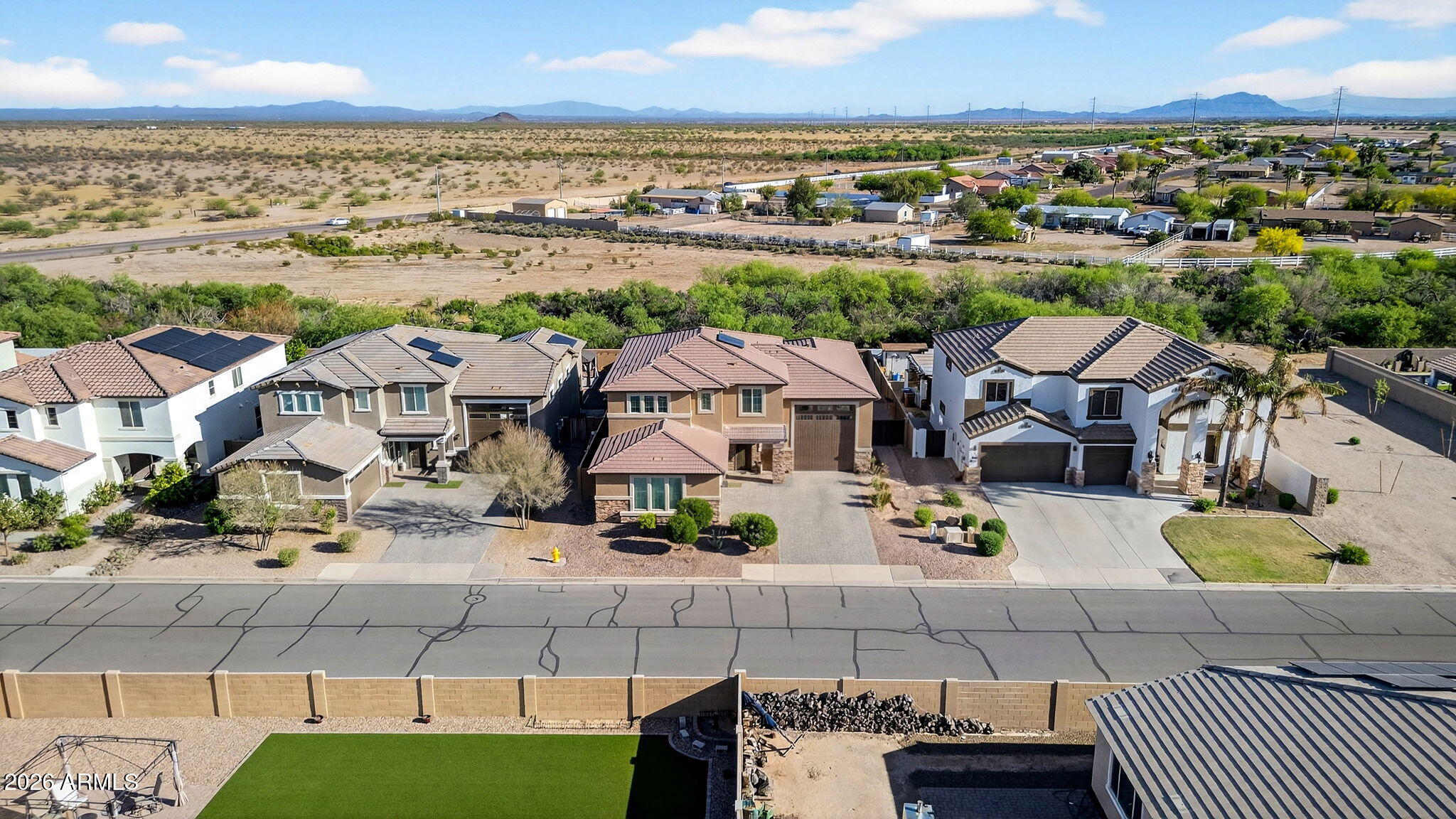 10061 Cotton Road Florence, AZ 85132 - Photo 2 of 53 an aerial view of residential houses with outdoor space