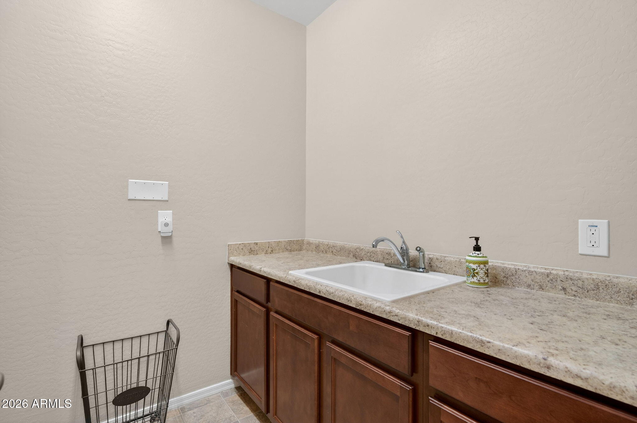10061 Cotton Road Florence, AZ 85132 - Photo 39 of 53 a bathroom with a granite countertop sink and a mirror