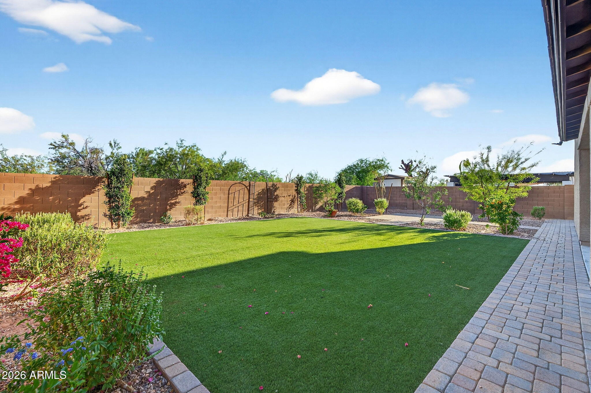 10061 Cotton Road Florence, AZ 85132 - Photo 46 of 53 a view of a golf course with a lake