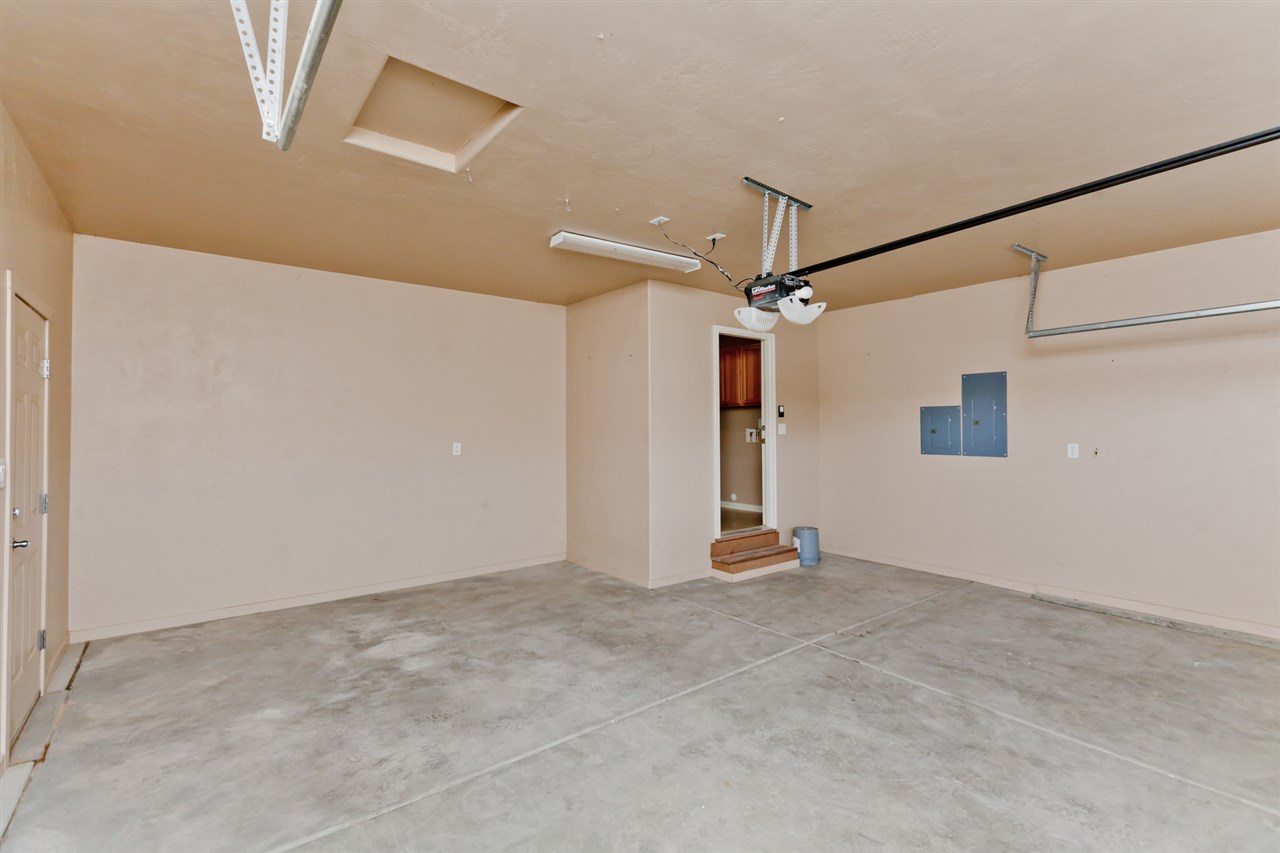 3138 Dublin Way Grand Junction, CO 81504 - Photo 16 of 42 an empty room with an entryway and windows