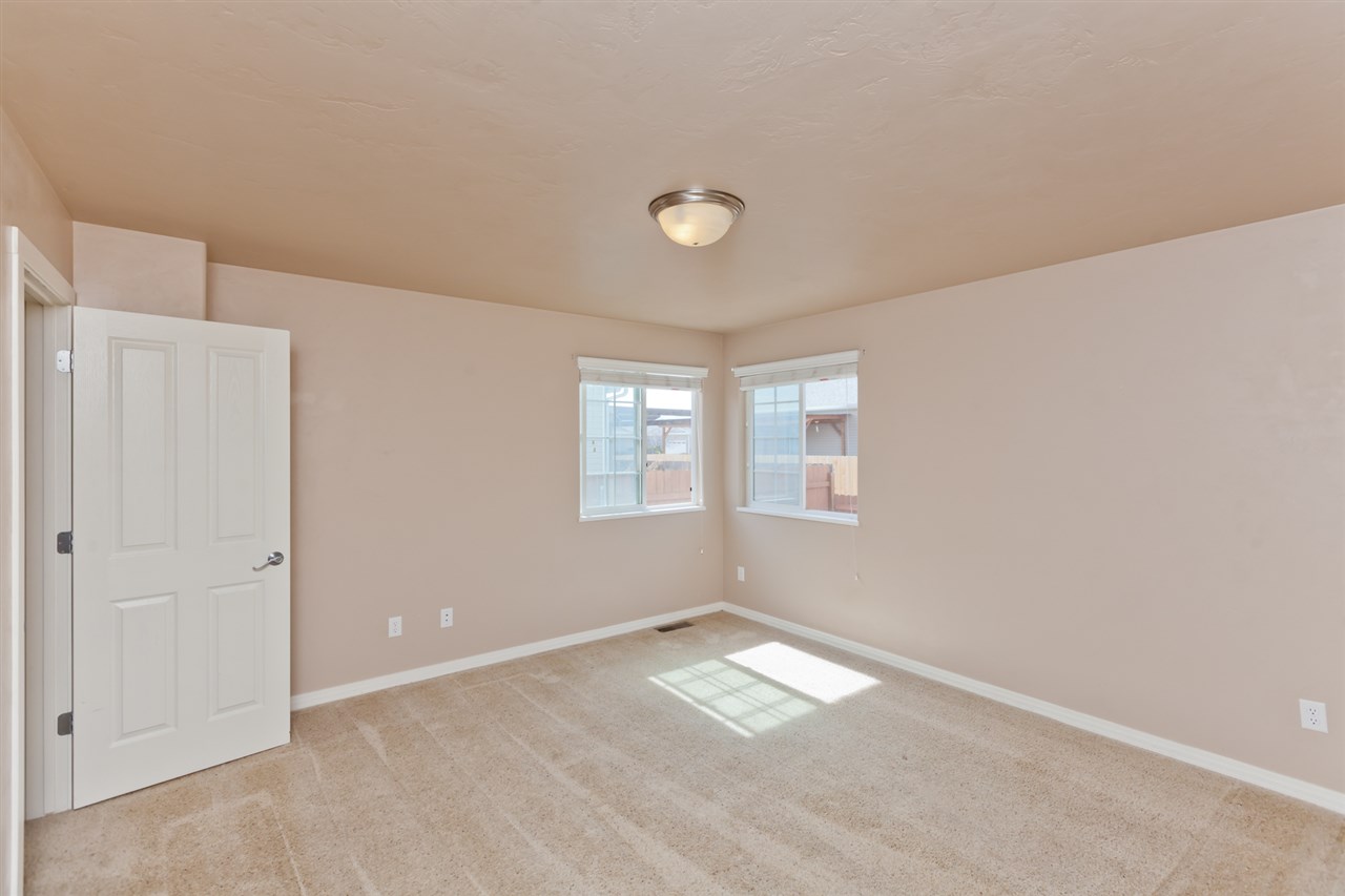 3138 Dublin Way Grand Junction, CO 81504 - Photo 17 of 42 a view of empty room with a window